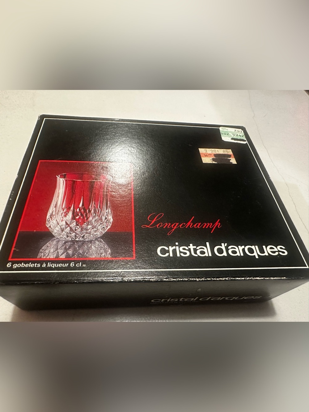 Longchamp Black Box with Red Accent and Crystal Glass Image